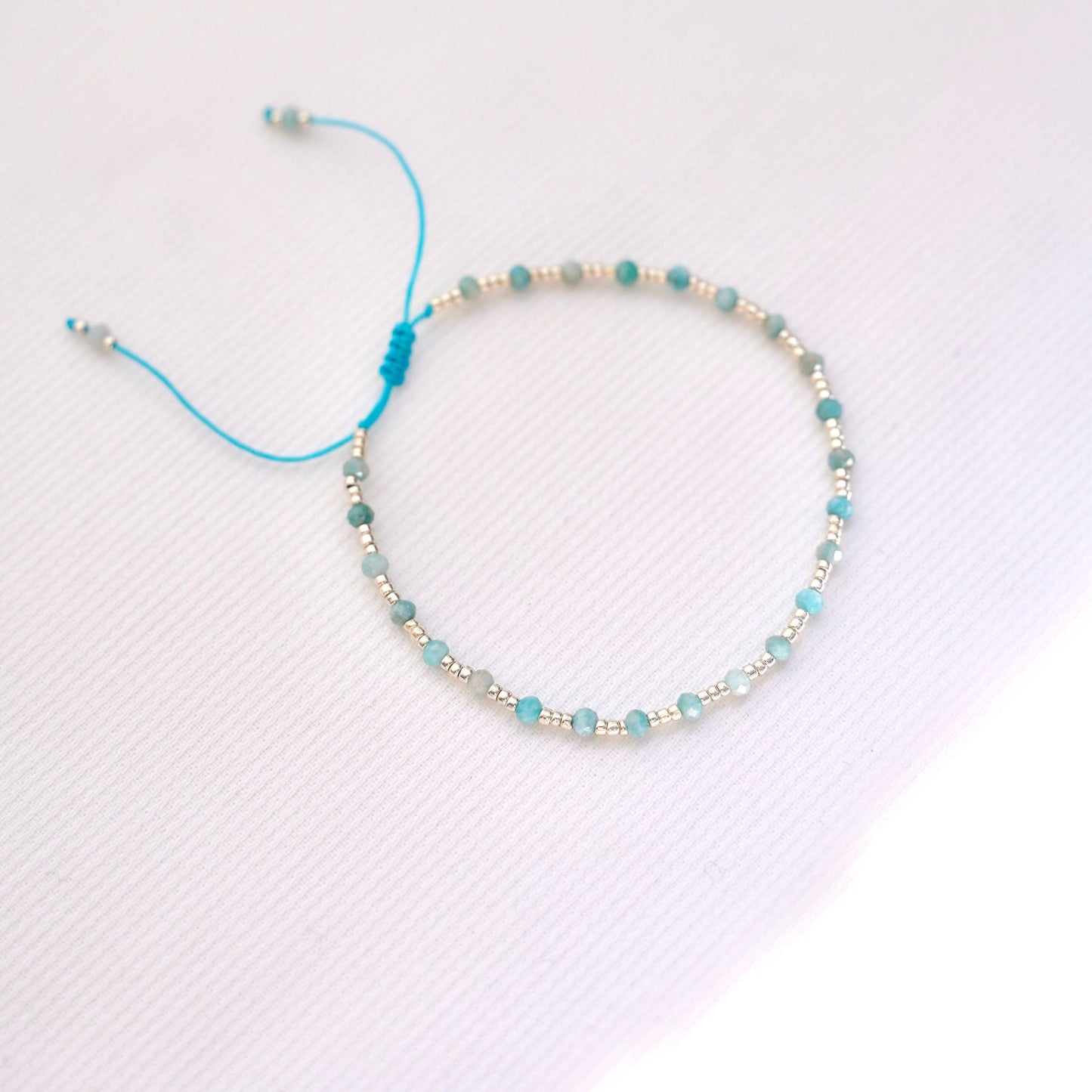Women's bracelet with turquoise blue and silver beads